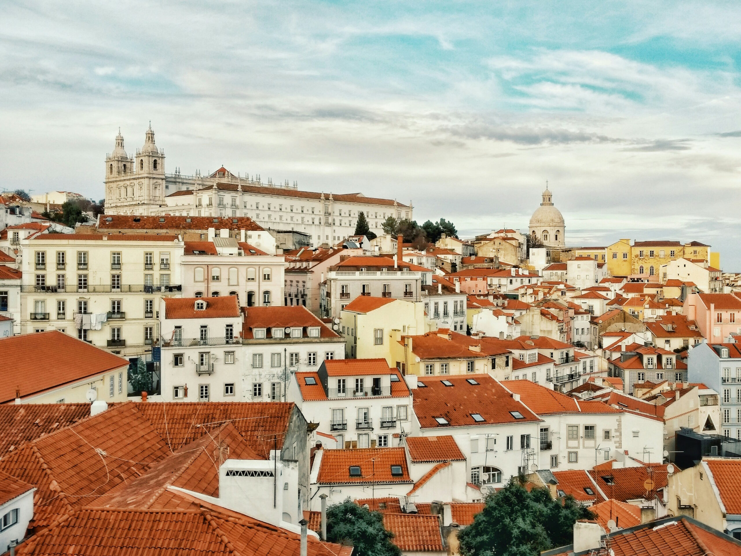 Photo of the roofs and the castle of Lisbon, capital of Portugal