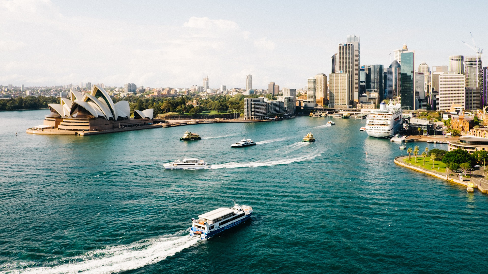 Aerial shot of the bay and the Opera in Sydney, capital of Australia