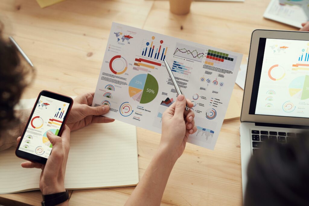 2 colleagues collaborating on a dashboard illustrating that they must work together on various business processes