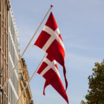 Flag of Denmark floating on a building