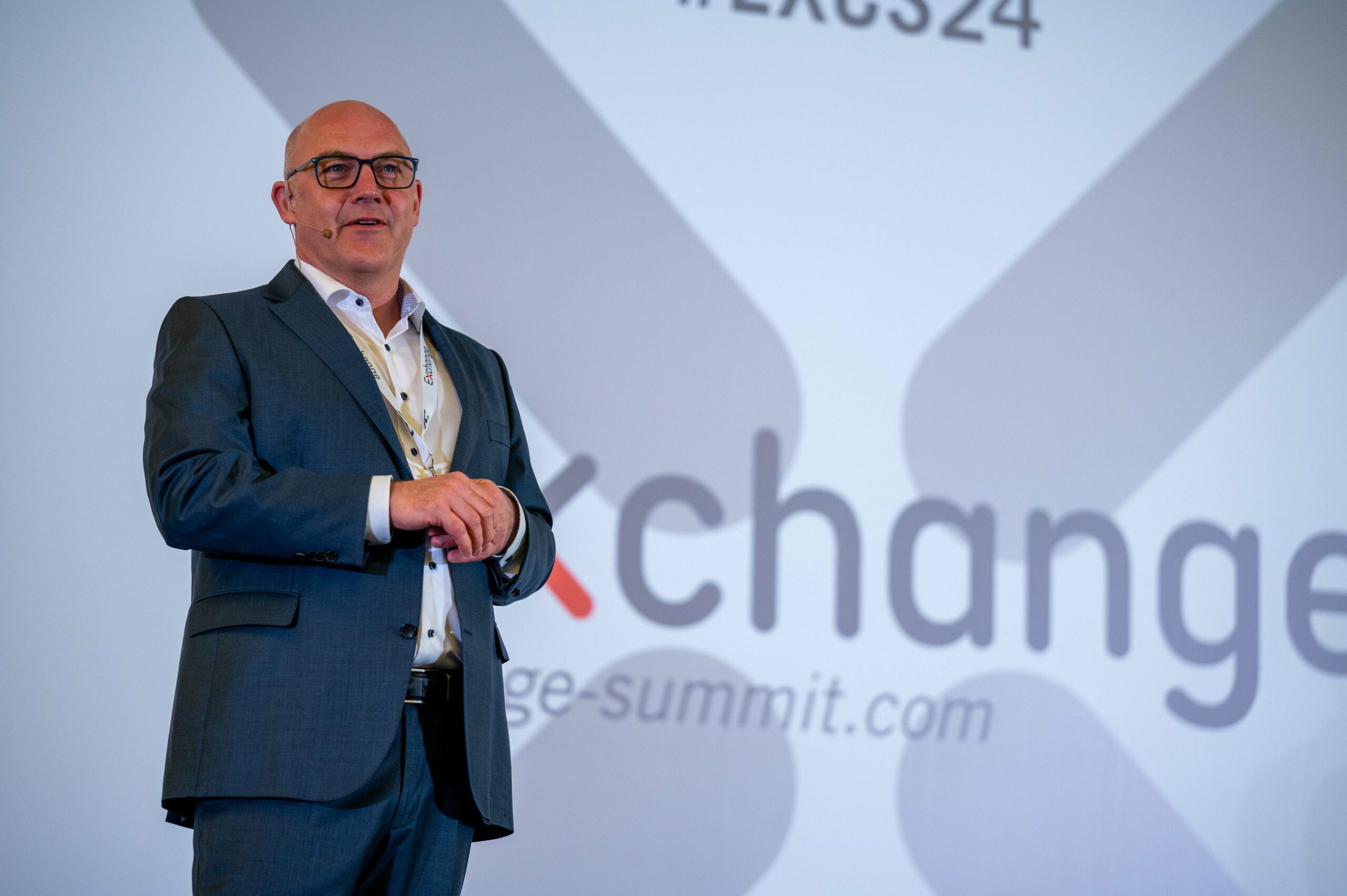 Johannes von Mulert on stage at the Exchange Summit